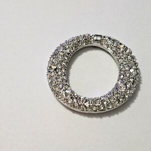 Rhinestone Oval with heart-shaped holes on the back